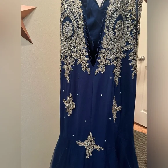 Blue mermaid style prom dress with gold detailing from Anny Lee. - Picture 2 of 5